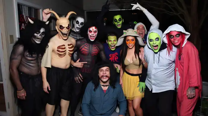 An image of the classic monster group photoshoot idea for Halloween, featuring people dressed as different monsters.