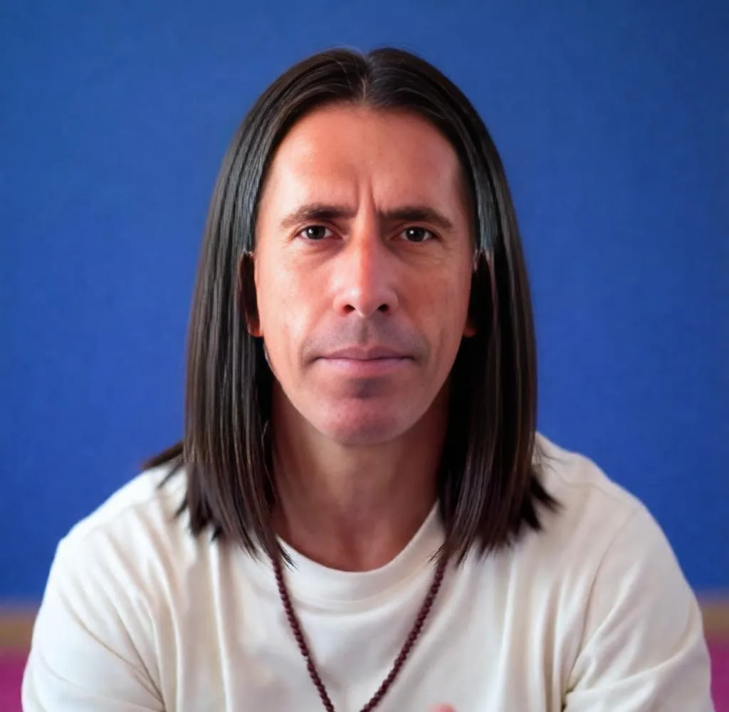 Man with shoulder-length straight hair