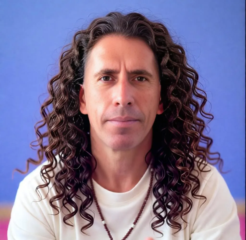 Man with long loose curls